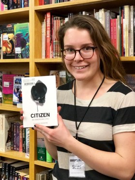 annie-h-with-book-wall